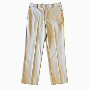 IZOD GOLF slim fit flat front pleated leg light khaki pants size 34 x 32